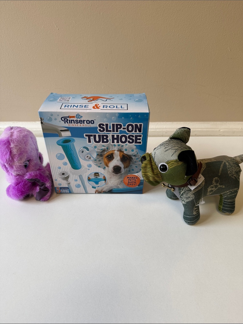 Bundle of Rinseroo Slip-On Tub Hose; Stuff Frenchie & squeaky Kong dog toy
